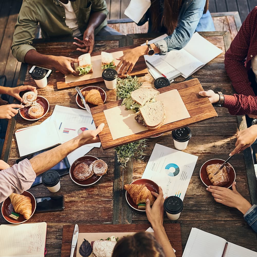 Corporate lunch made better—fresh sandwiches, pastries, and coffee fuel productive conversations. Enquire now for office catering.